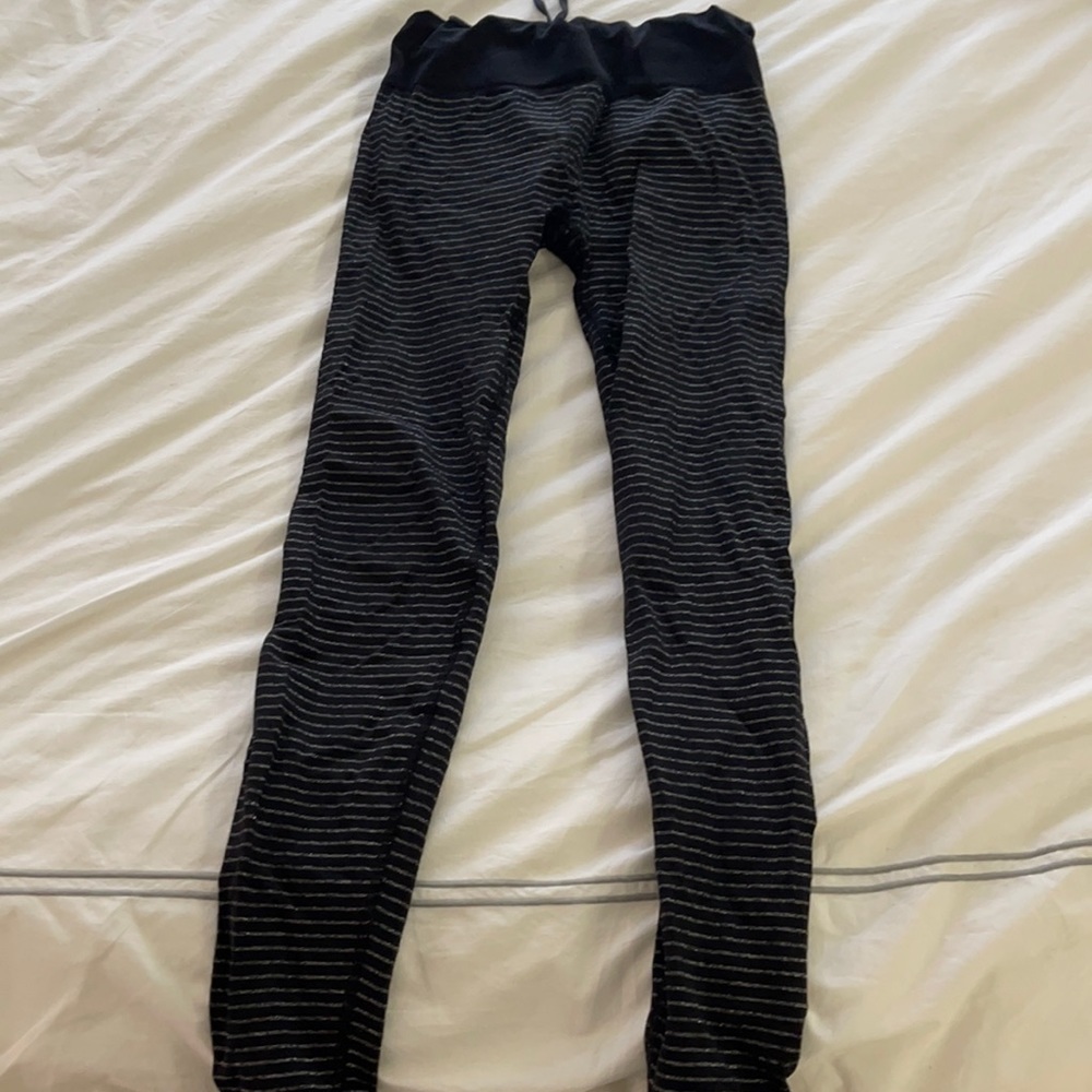 Athletes black with silver stripe leggings